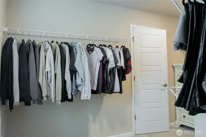 Expansive walk-in closet with ample storage
