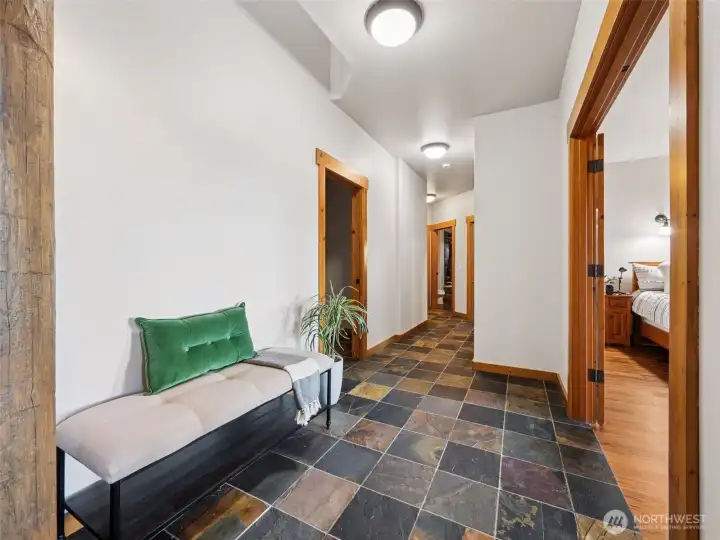 Entry from Main Floor leads to Primary En Suite