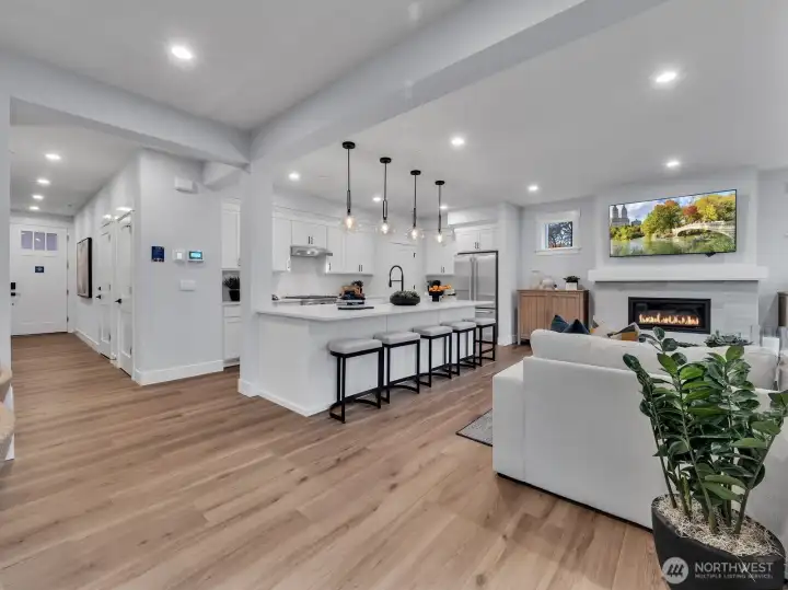 Welcoming gas fireplace warms the entire main level.