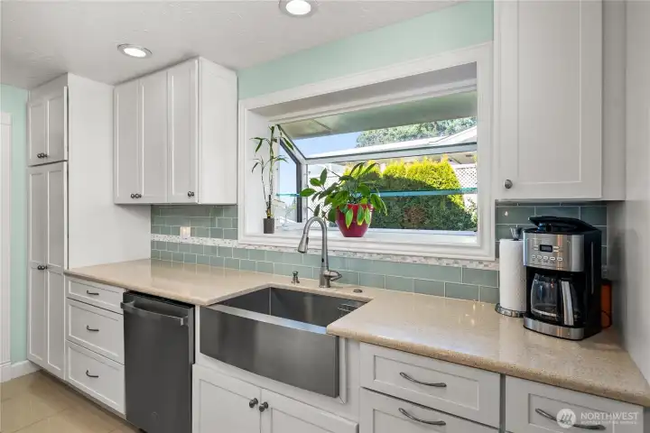 Garden window, stainless steel sink, new dishwasher!