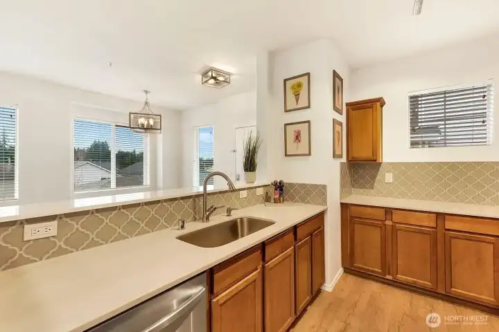 BIG kitchen!  Fully updated - new quartz countertops, new sink & faucet, new stainless steel appliances, new stylish backsplash, and new flooring.