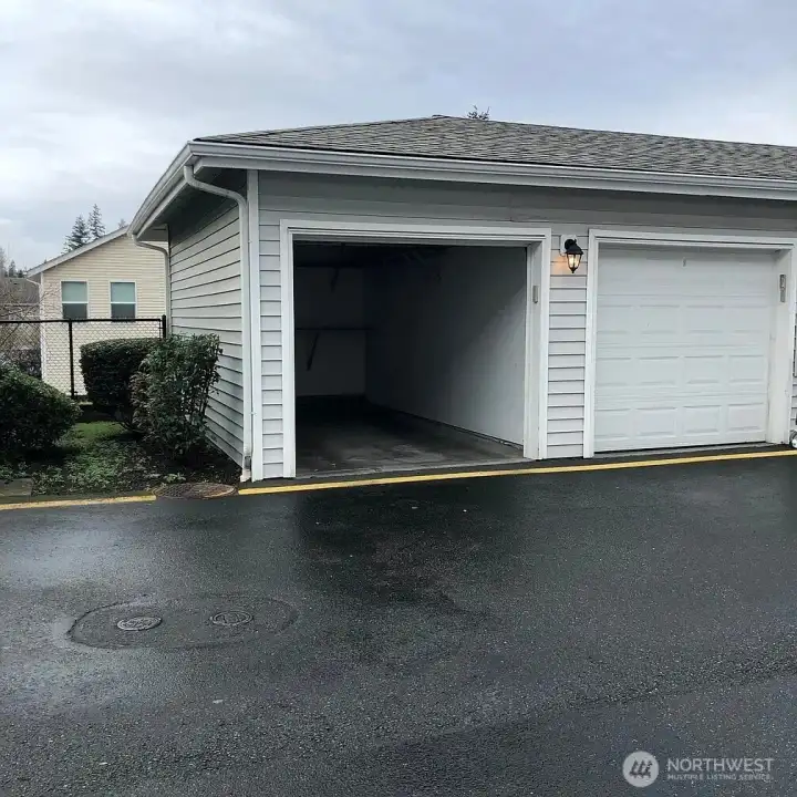 Your very own garage.  Park you car in here or use it for storage.  Home also comes with 1 uncovered parking space. 2 parking spaces in total.