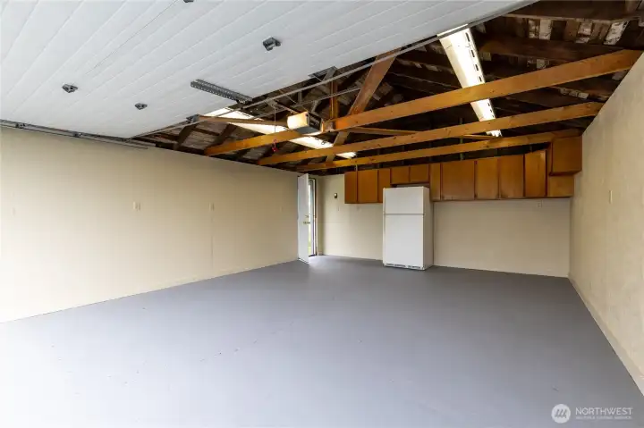 Detached garage with 220V power. Extra fridge stays!