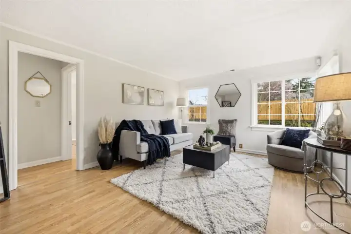 Spacious living room upon entry; door in the back goes to 2 bedrooms and 1 bath