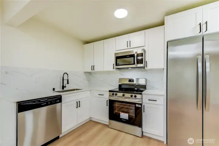 Updated kitchen with stainless steel appliances