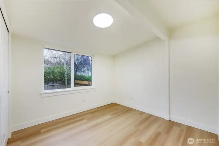 Spacious bedroom with fresh finishes