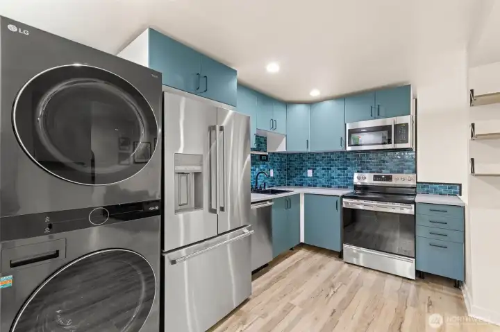 Two sets of washer & dryers stay with home.