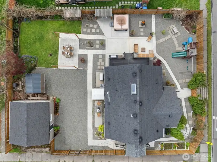 Large corner lot with detached 2 car garage & RV parking.