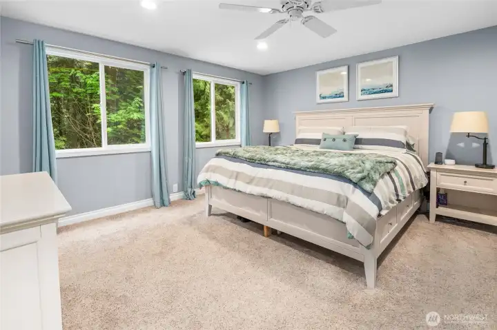 Owner Suite with huge walk-in closet, windows to backyard, en-suite bathroom with 2 sinks and large glass shower!