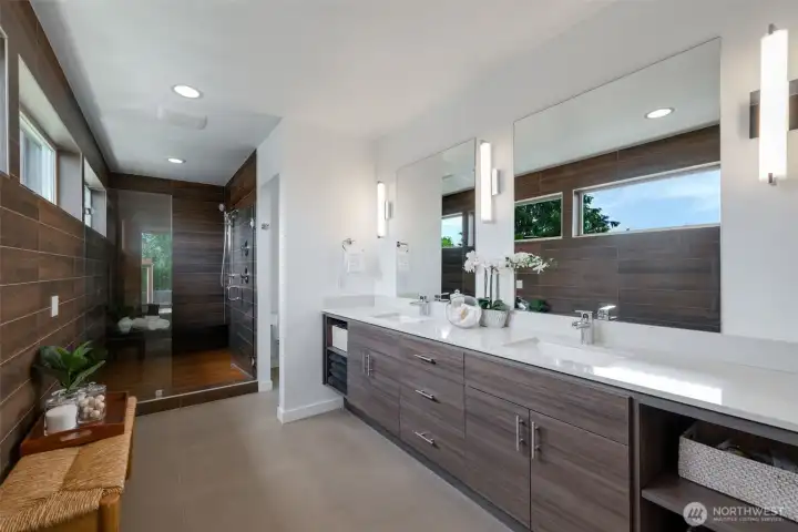 The bath is complete with dual vanity, dramatic tile work, oversized walk-in shower, and separate toilet room The bath is complete with dual vanity, dramatic tile work, oversized walk-in shower, and separate toilet room