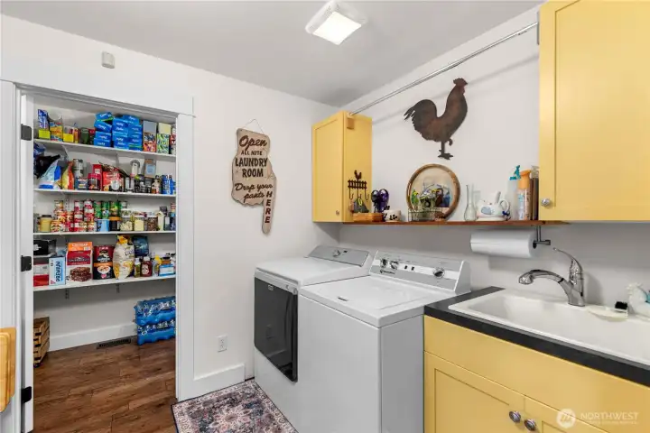 Oversized utility room with ample store space + HUGE walk in pantry