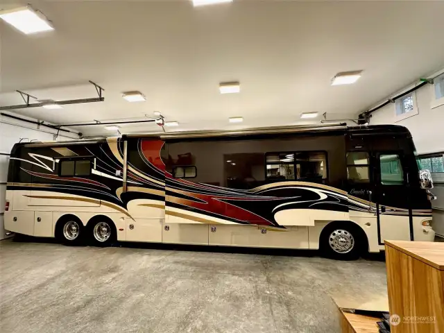 Garage holds up to 4 cars and space to park a 45' RV bay.