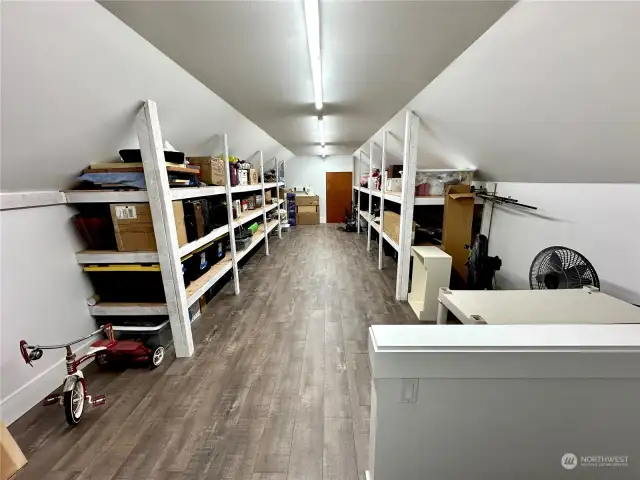 This fully finished attic space offers loads of extra storage opportunities!