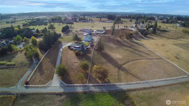 Welcome Home to this 9.78-acre estate in Enumclaw offering unparalleled views of the Cascades & Mount Rainier