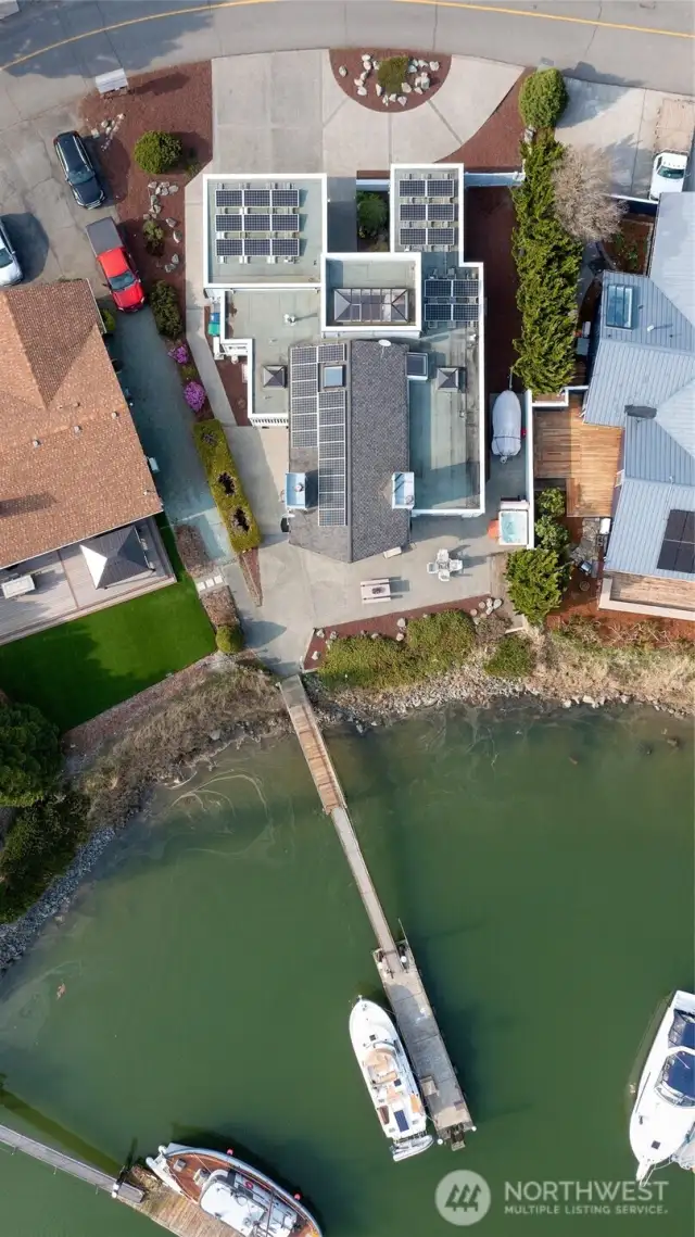 This home has an abundance of solar panels (owned) to help with sustainability and your electric bill. It also boasts 5 skylights - 2 with electric opening.