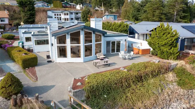 An abundance of solar panels adorn the roof for sustainable energy. This home also boasts 5 skylights that provide natural light throughout.