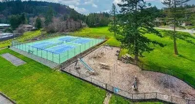 Enjoy tennis courts and a fenced in playground. The pickleball and sports courts are just up the road.