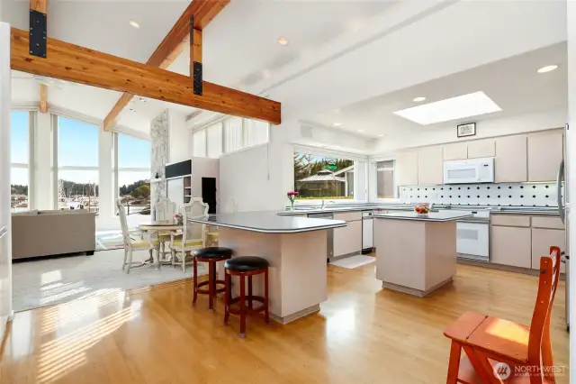 Perfect for entertaining, this spacious kitchen features an island and seamlessly flows into the great room, creating an open and inviting space for cooking, dining, and gathering.