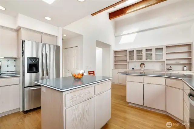 The light and bright kitchen offers abundant storage and built-ins close by to display your favorite collectibles.