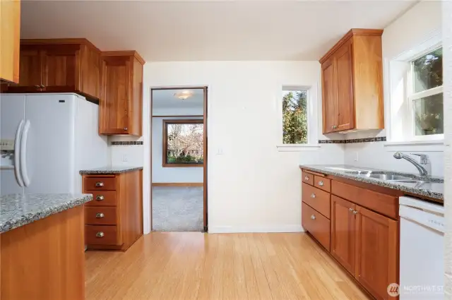 Looking back toward the dining room, one notices the durable bamboo flooring.