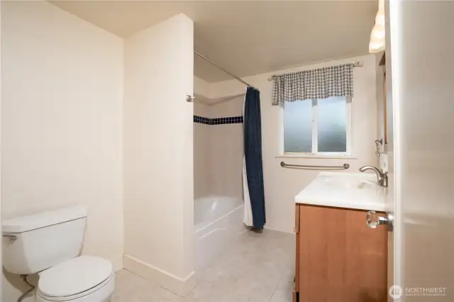 A full bath is located on the main floor.  The generous size would allow for a fresh take on this room- a double vanity?  Sure, why not?  Walk in closet and a tub?  Probably...  Blank canvas ready for use today or put your personal mark on the design and redo.  Choices.