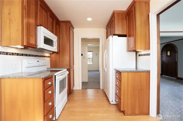 You'll notice that one can enter, and exit, the kitchen from multiple areas- the circular floor plan is perfect for entertaining and day to day life.