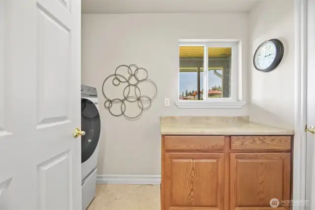 Full size laundry room on main level with windows [one of two laurndry rooms]
