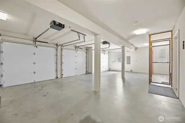 Massive 3 car garage with pet kennel with door for your pets to access the beautiful yard or can be used for secured storage [seller will remove kennel upon request]
