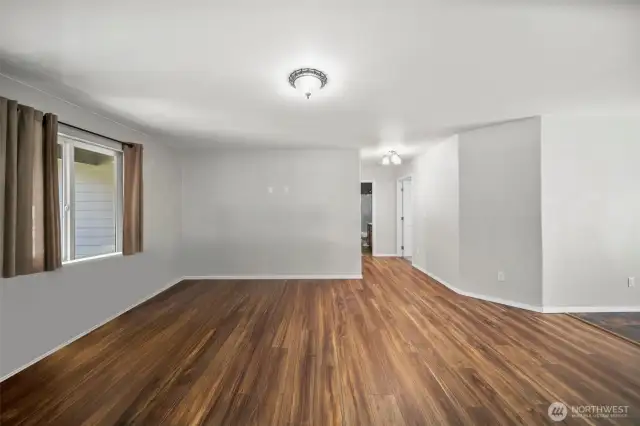 Living room looking towards hallway to 2nd & 3rd bedroom.