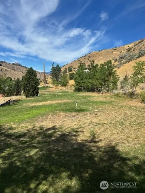 More room to build a shop above. There is also a dirt road access to upper portion.