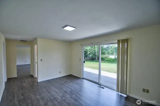 Separate den/family room with slider accessing rear patio.
