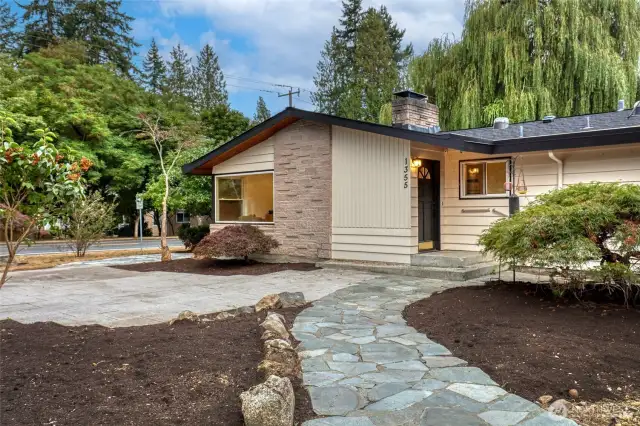 Front yard with flagstone walkway and front yard patio