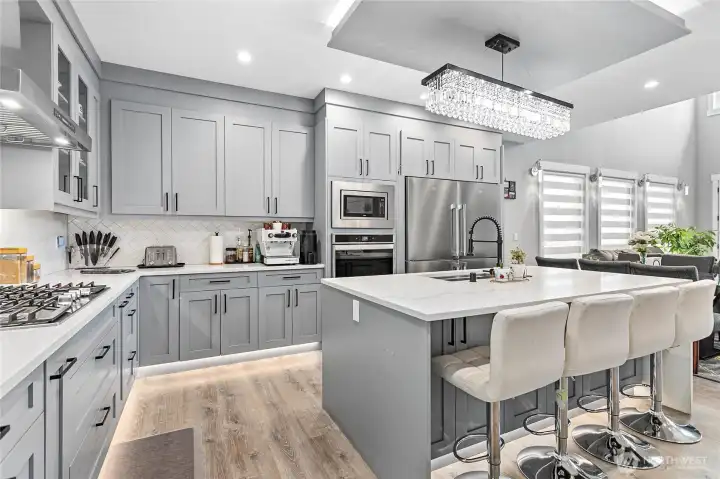 Elegant kitchen with undercabinet lighting.