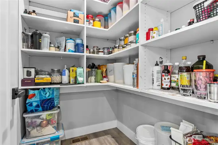 Walk in pantry next to the kitchen.
