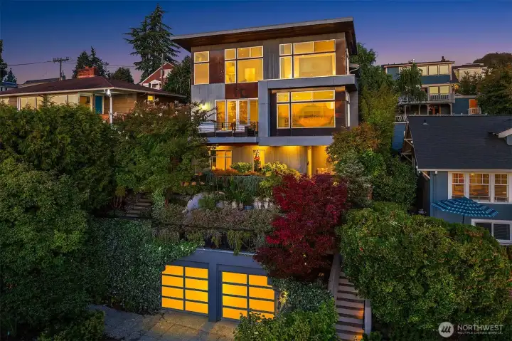 Stunning custom home with sweeping Elliott Bay and mountain views - designed for unforgettable entertaining.