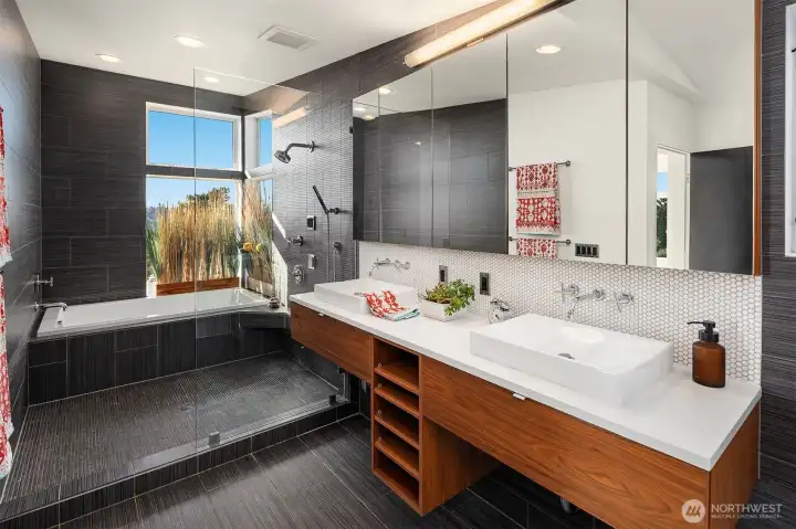 Primary bath with tub and shower and views