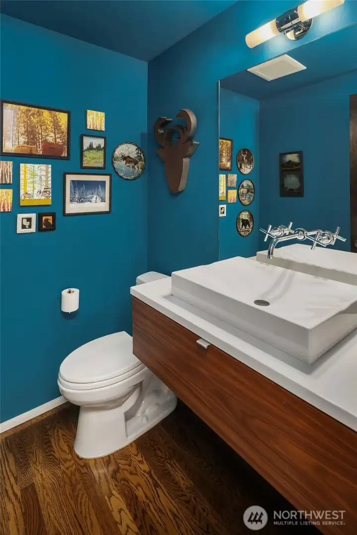 Remodeled half bath for your guests on the main floor.