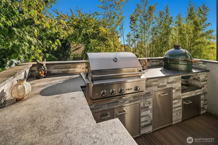 Enjoy views of Elliot Bay as you BBQ! This house is party-ready.  Invite your friends over for a bite and swim. Great outdoor kitchen with high performance gas grill, fridge and Green Egg smoker!