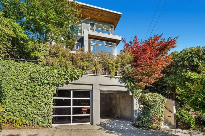 RARE and hard to find 2-Car garage! Store your classic cars here or make it into a home gym?