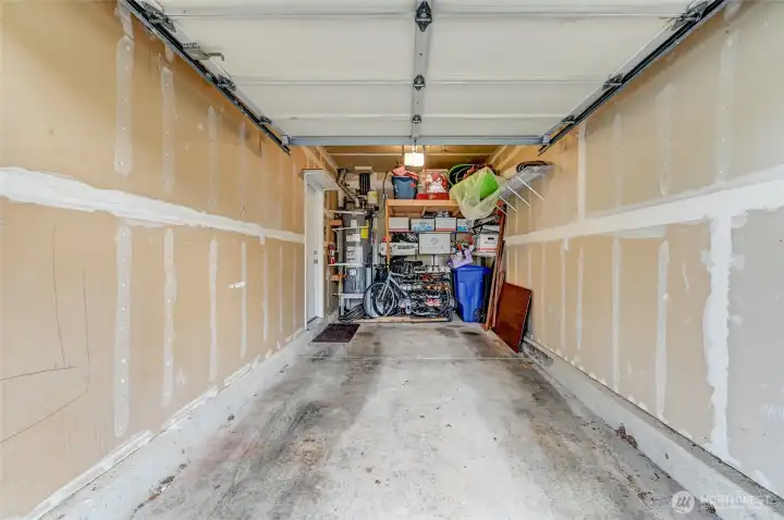 The personal one-car garage is ideal, providing secure parking and a private entrance directly into the condo for added convenience. Additional parking is available with a driveway spot right in front of the garage, perfect for a second car.