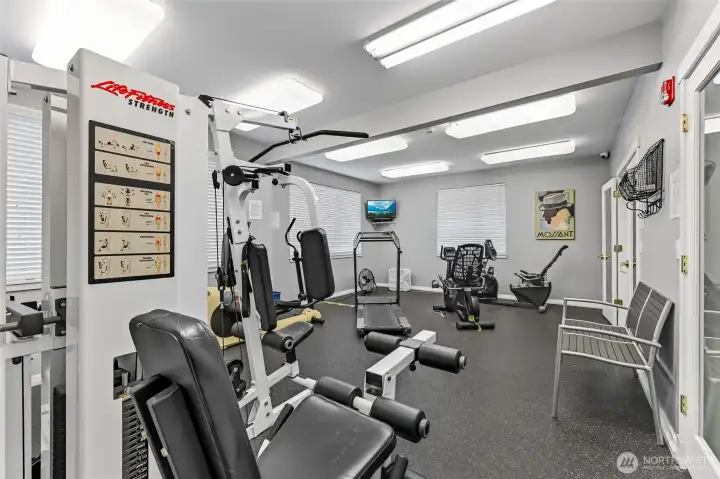 Enjoy a roomy and well-equipped athletic room that comfortably accommodates your fitness routine.
