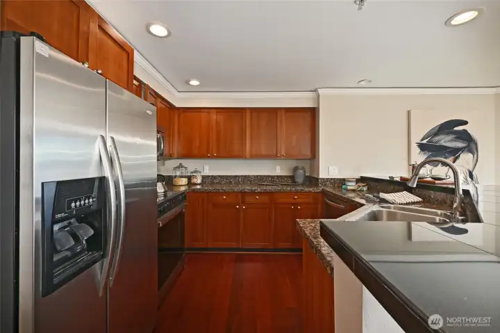 Kitchen with Cherry cabinets, stainless steel appliances, granite countertops,