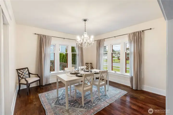 Enjoy dinner together in your elegant dining room with era appropriate lighting and touches