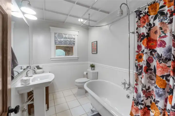 Main floor full bath close to main floor bedroom and office with closet