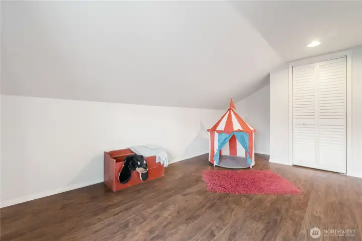 Upstairs bedroom with new flooring