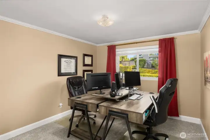 Third bedroom on the main level with new carpet.