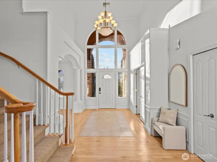 Grand two story light filled entry facing SE.