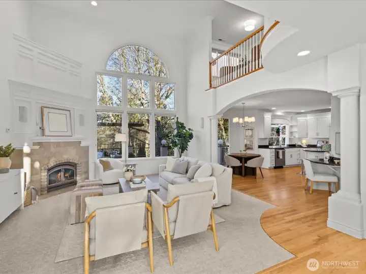 Light filled two story great room with gas fireplace.