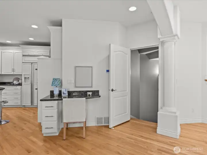 Open door is the access to downstairs apartment. The door can be locked at the top and bottom of the staircase.