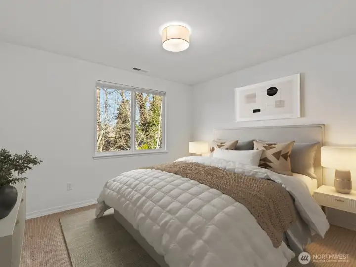 One of 3 bedrooms on the second floor. Virtually staged.